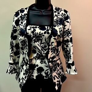 Two pieces camisole top with a jacket . Size Med